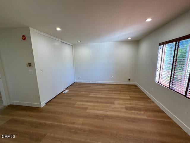 4061 Donlon Road Somis, CA 93066 - Photo 12 of 23 an empty room with wooden floor and windows