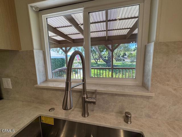 4061 Donlon Road Somis, CA 93066 - Photo 8 of 23 a kitchen with a sink a window and stainless steel appliances