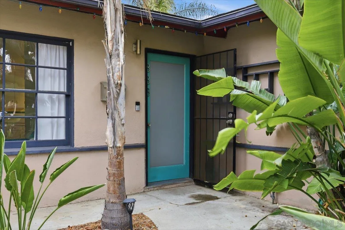 8888 Jaylee Avenue Spring Valley, CA 91977 - Photo 14 of 19 a house with a plant on the wall