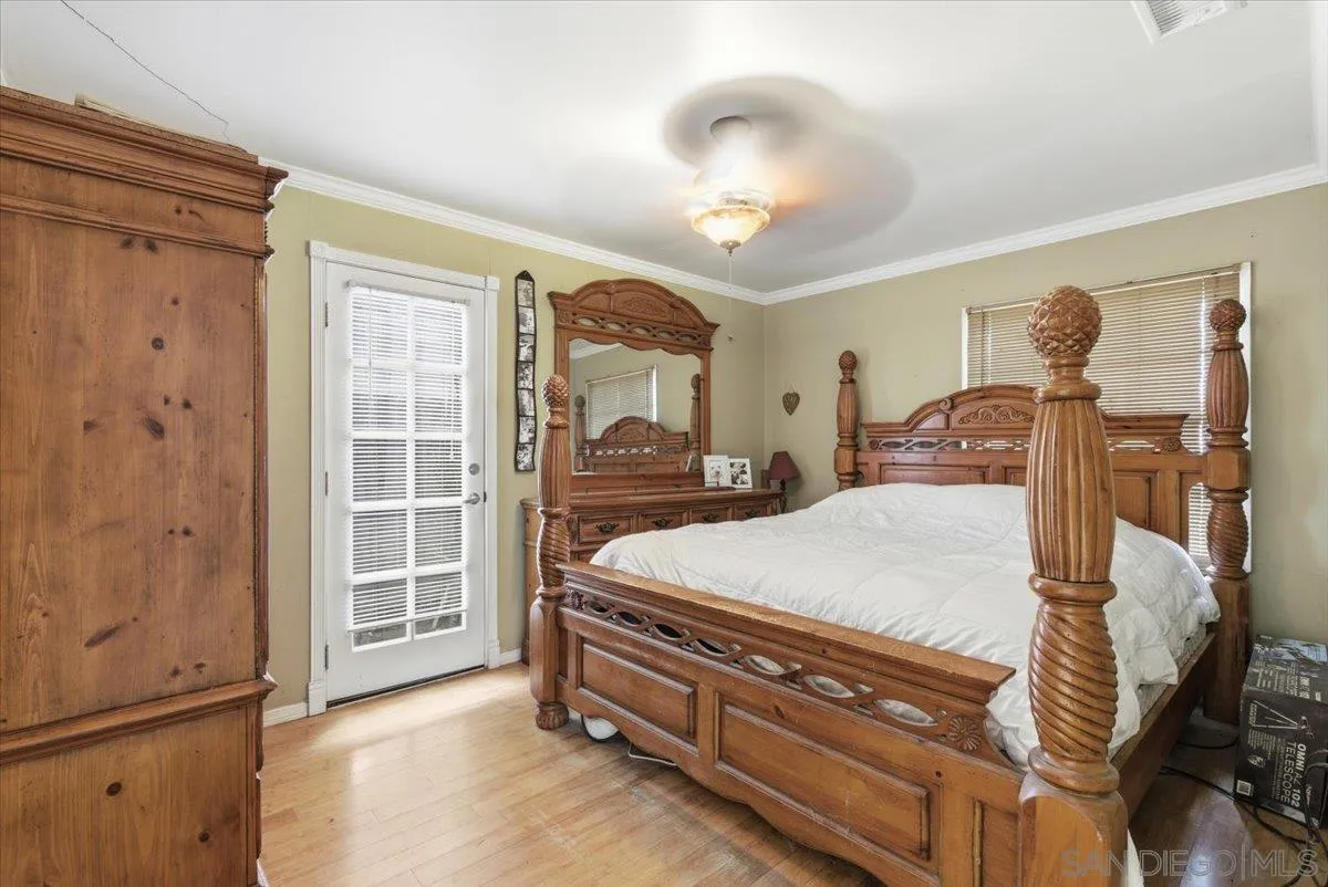 8888 Jaylee Avenue Spring Valley, CA 91977 - Photo 19 of 19 a bed room with a bed and a window