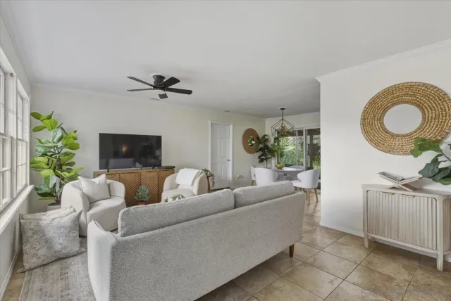 a living room with furniture and a window