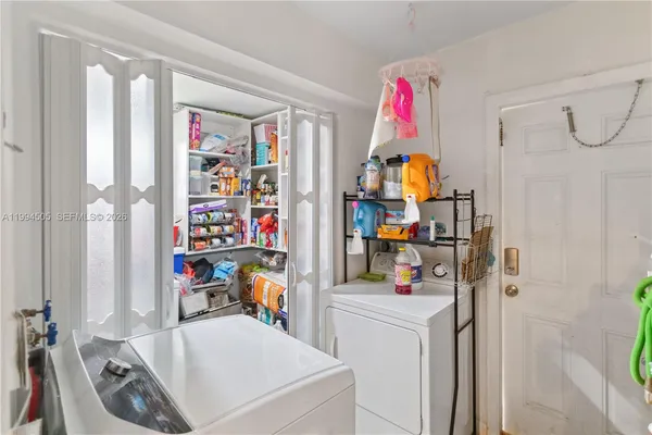 a bedroom with a bed and a closet