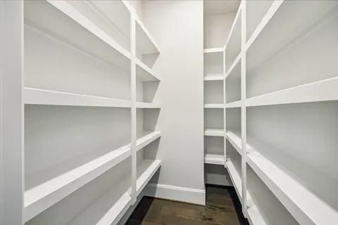 a view of an empty walk in closet