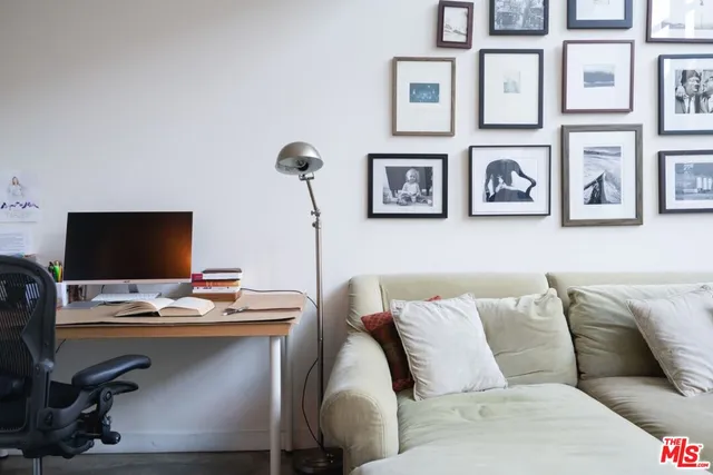 a view of a workspace with furniture