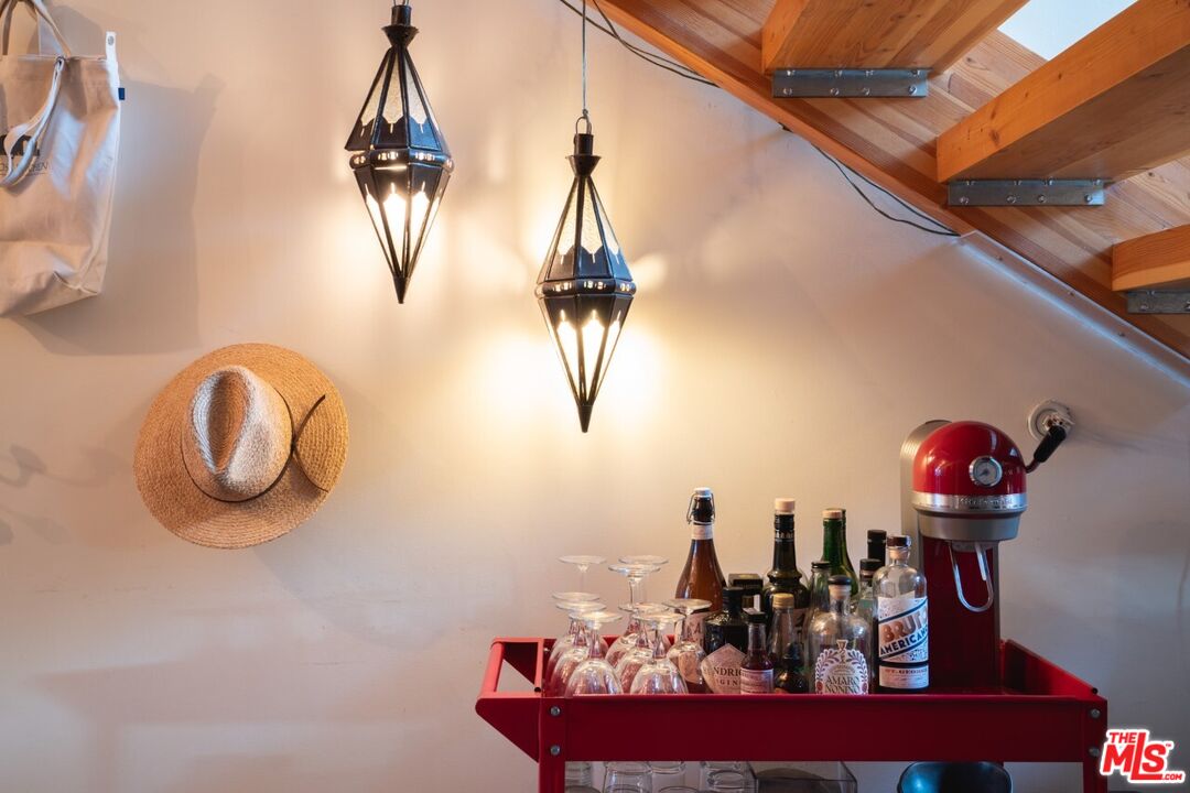 700 Main Street, Unit 12 Venice, CA 90291 - Photo 8 of 27 a view of a dining room with a small chandelier