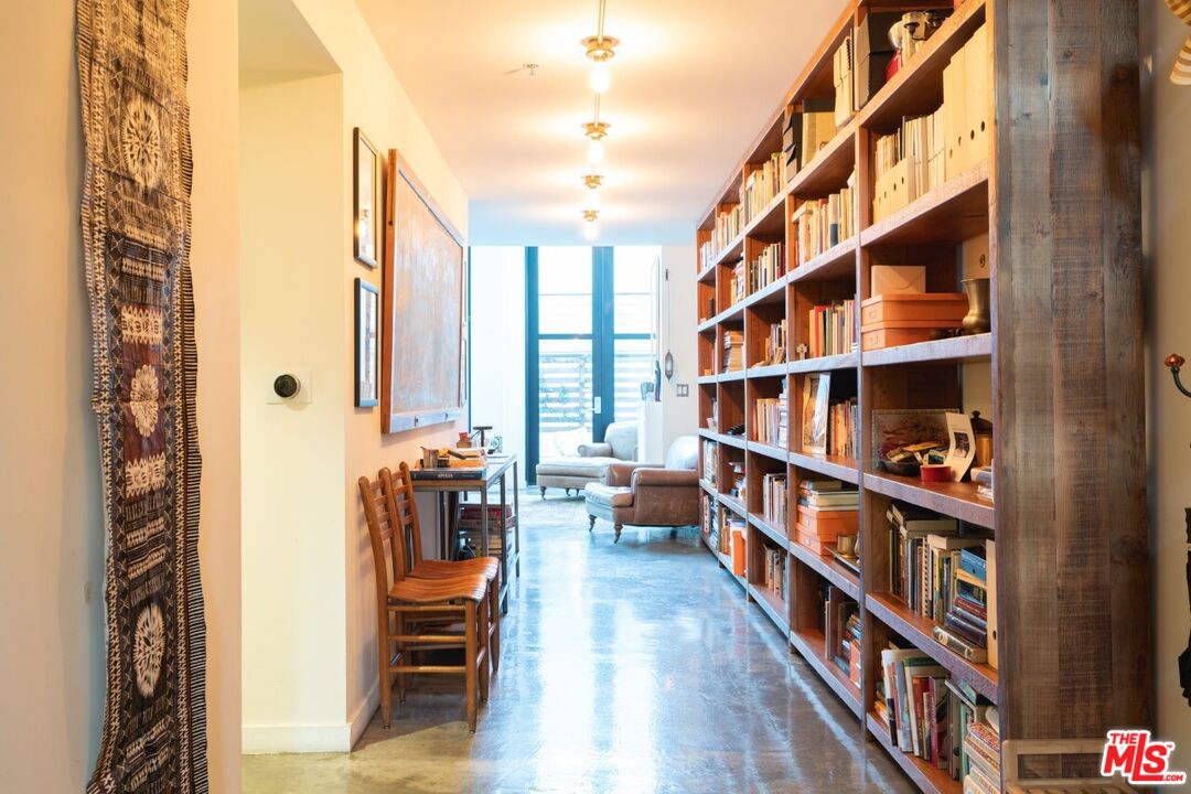 700 Main Street, Unit 12 Venice, CA 90291 - Photo 9 of 27 a view of a living room with furniture and wooden floor