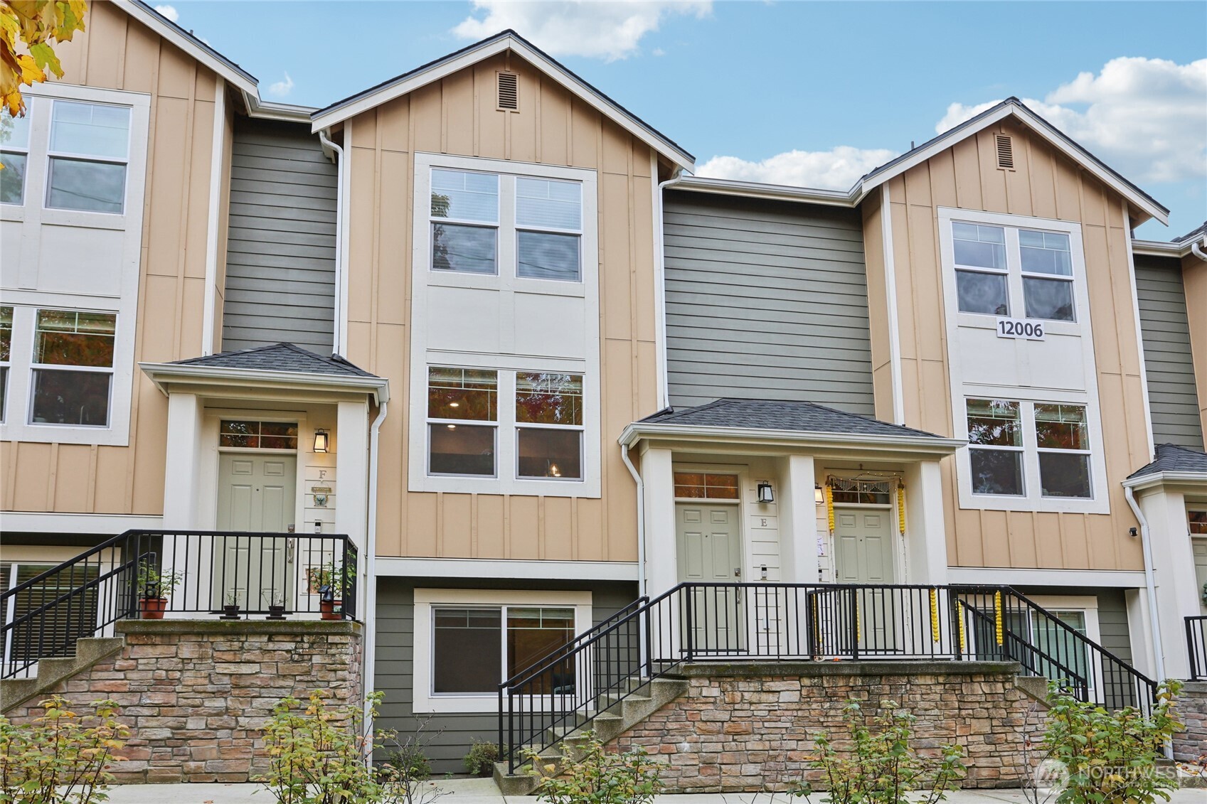 a view of a house with large windows