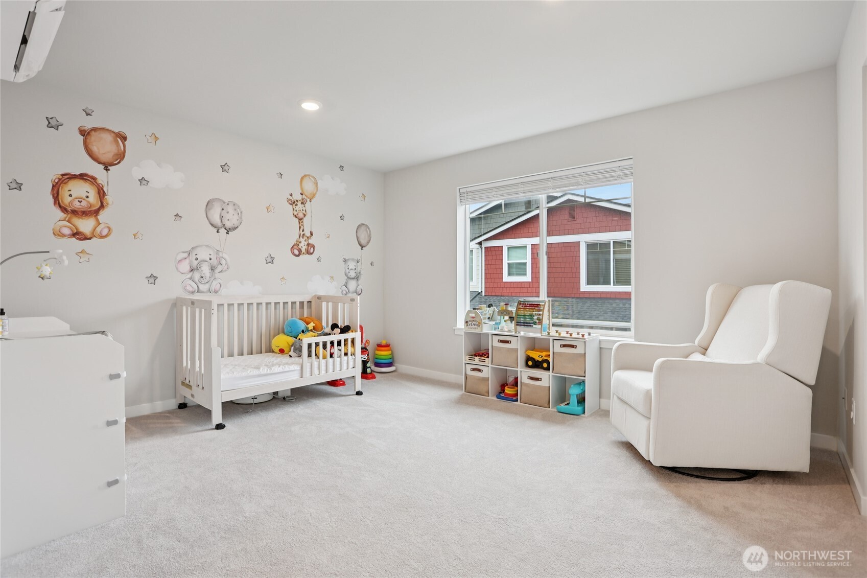 12006 Northeast 194th Drive, Unit E Bothell, WA 98011 - Photo 14 of 25 a bedroom with furniture and a window