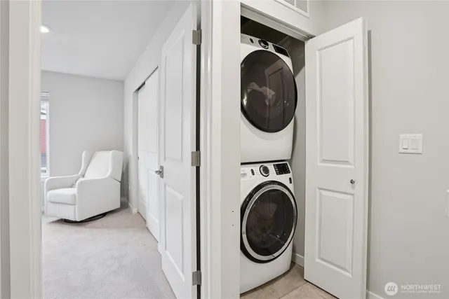 a bed room with a bed and a window