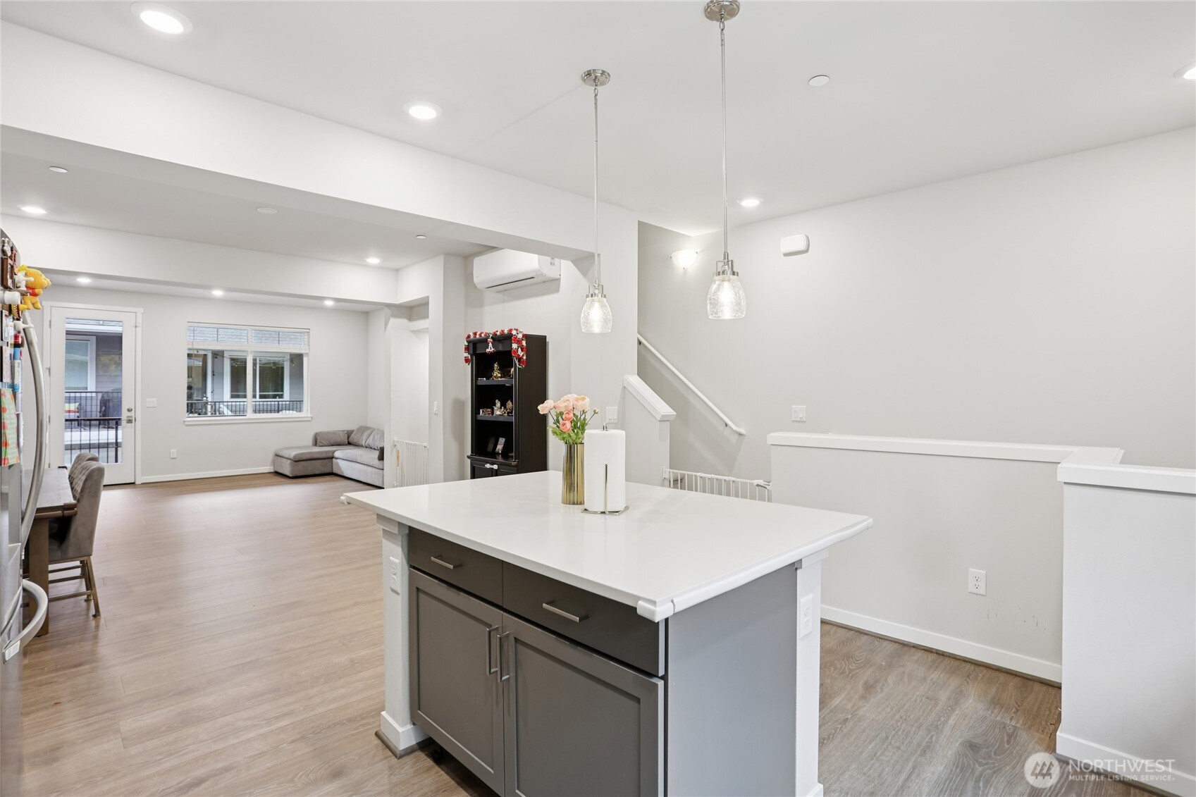 12006 Northeast 194th Drive, Unit E Bothell, WA 98011 - Photo 7 of 25 a kitchen with a sink a counter space appliances and cabinets