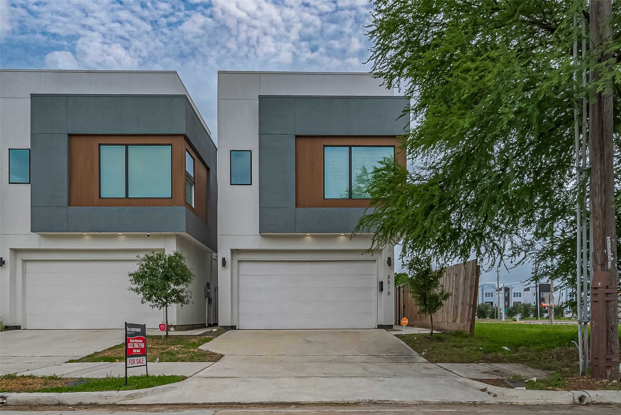 3510 Hadley Street Houston, TX 77004 - Photo 2 of 48 This striking two-story façade pairs geometric precision with layered tones for a crisp, modern look. The attached two-car garage is accented with sconce and recessed lighting, adding both function and flair to the architectural profile.