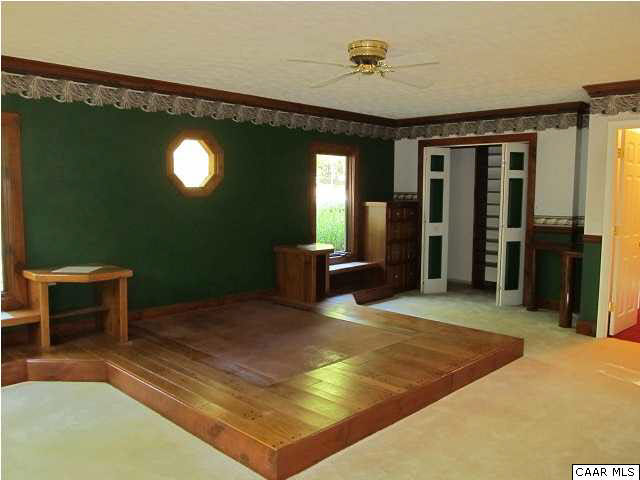 264 Creek Road Troy, VA 22974 - Photo 16 of 39 Master bedroom with built in end tables, dressers & shelving.