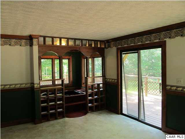 264 Creek Road Troy, VA 22974 - Photo 23 of 39 Master bedroom with sliding glass door & soak tub.