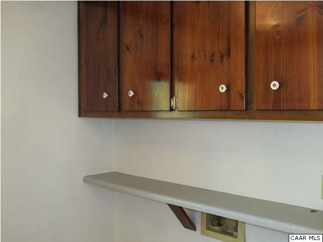 264 Creek Road Troy, VA 22974 - Photo 28 of 39 Laundry Room with cabinets.