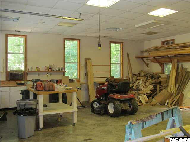 264 Creek Road Troy, VA 22974 - Photo 30 of 39 Detached Garage/Workshop with electricity & water. An large attached shed is in rear (not shown).