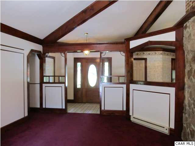 264 Creek Road Troy, VA 22974 - Photo 8 of 39 Family room with vaulted ceilings. Foyer with coat closet.