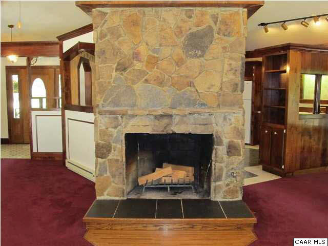264 Creek Road Troy, VA 22974 - Photo 9 of 39 Stone wood burning fireplace in family room.