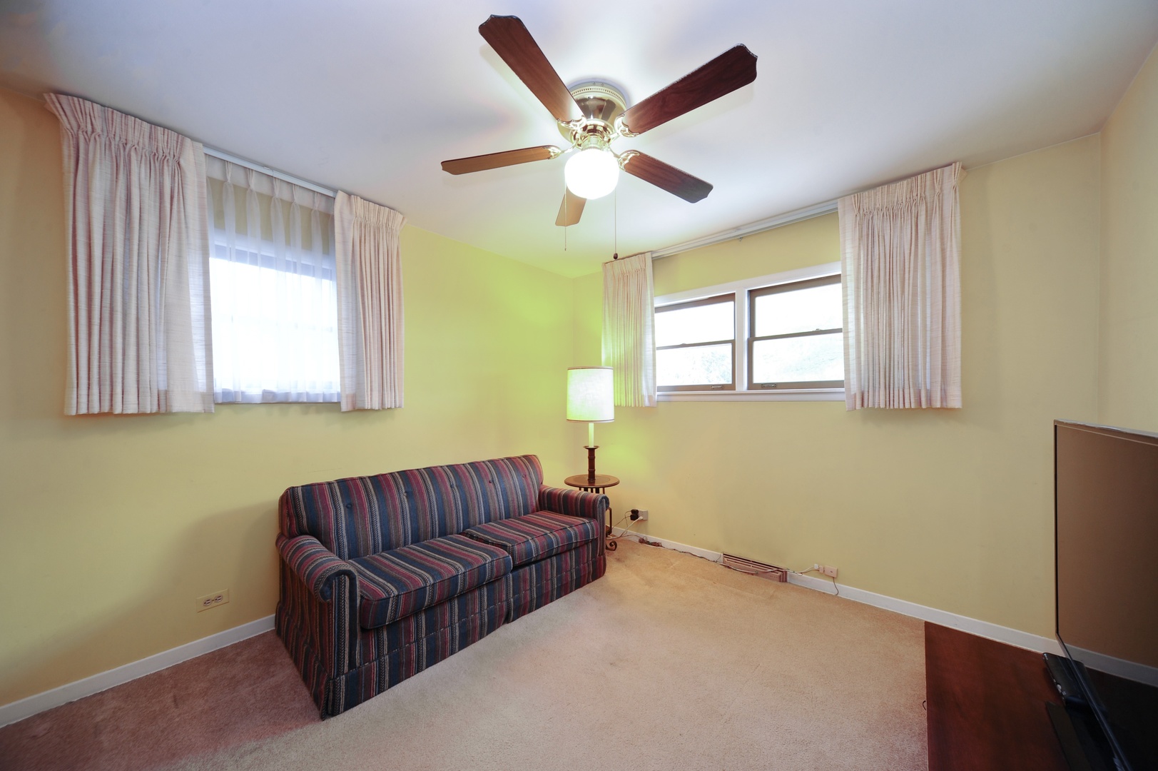 598 Sumac Road Highland Park, IL 60035 - Photo 6 of 10 a living room with a couch and a window