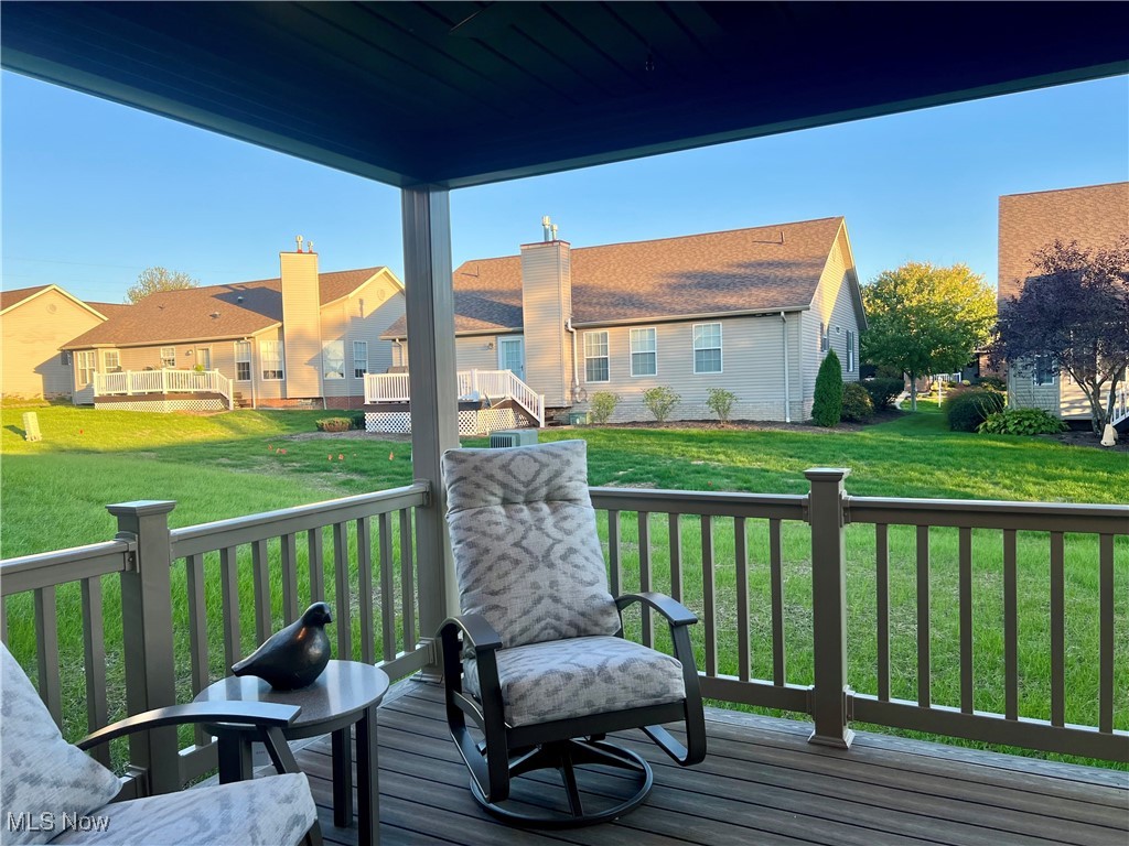 5531 Innkeeper Street Southeast Dennison, OH 44621 - Photo 26 of 30 Deck with a lawn