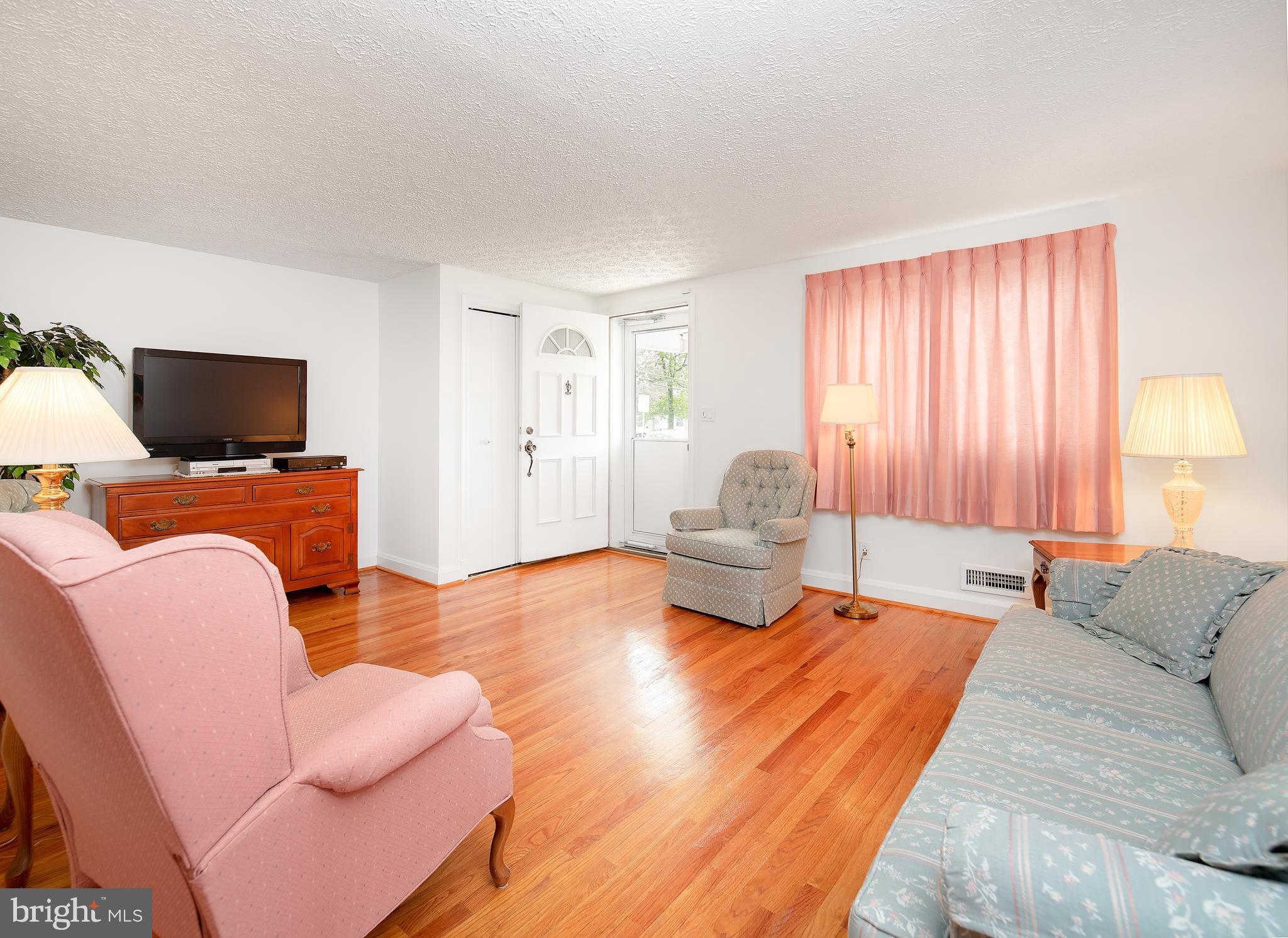 7860 Rockbourne Road Baltimore, MD 21222 - Photo 6 of 26 Gleaming Hardwood Floors