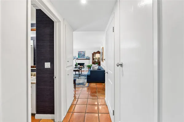 a room with furniture and wooden floor