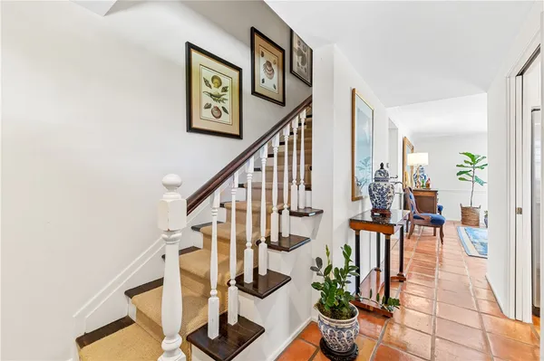 a view of entryway with wooden floor