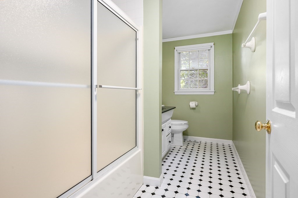 21 Micah Hamlin Road Centerville, MA 02632 - Photo 15 of 42 a bathroom with a toilet and a shower