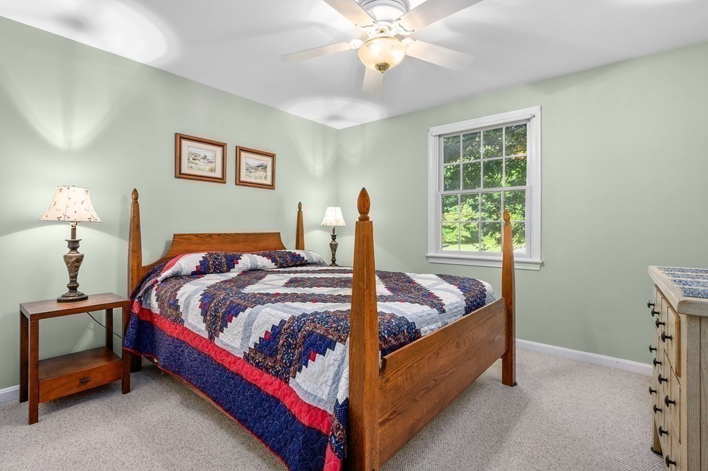 21 Micah Hamlin Road Centerville, MA 02632 - Photo 19 of 42 a bed room with a bed and a window