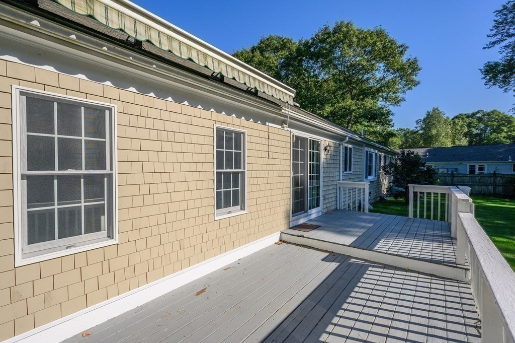 21 Micah Hamlin Road Centerville, MA 02632 - Photo 29 of 42 a view of backyard with a deck