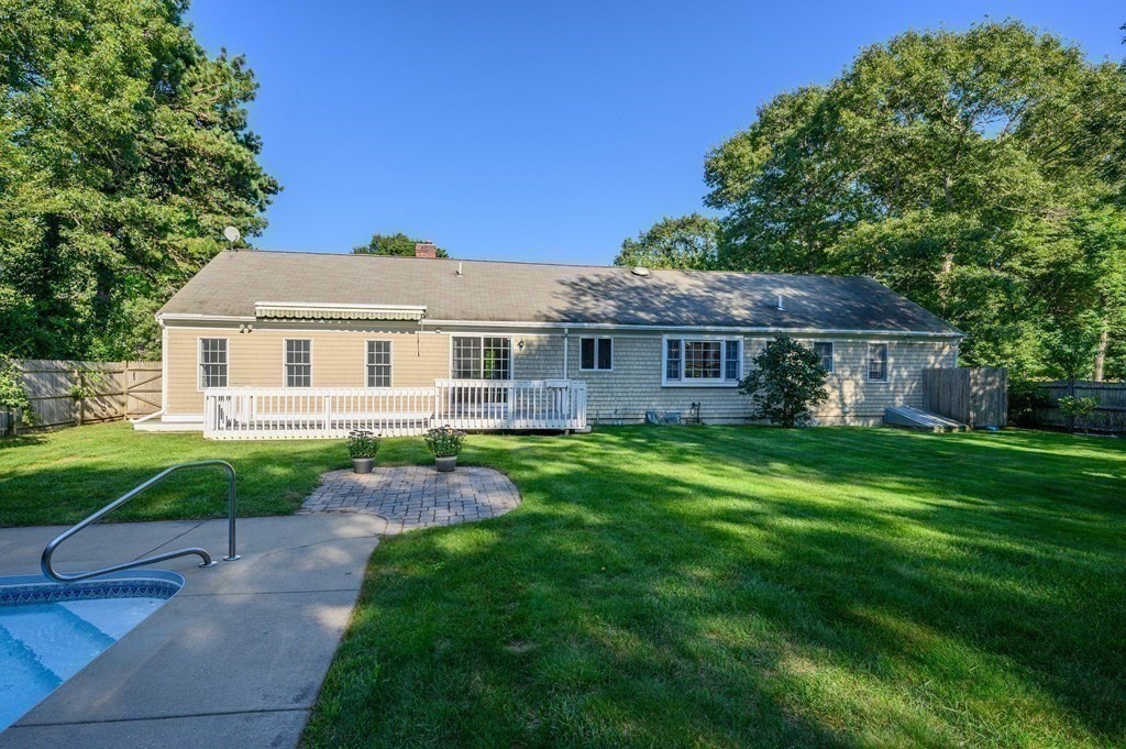 21 Micah Hamlin Road Centerville, MA 02632 - Photo 33 of 42 a view of a house with a yard and sitting area