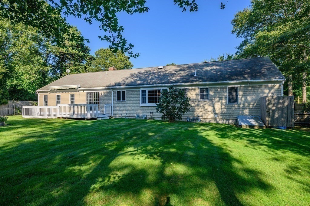 21 Micah Hamlin Road Centerville, MA 02632 - Photo 34 of 42 a view of a house with a backyard