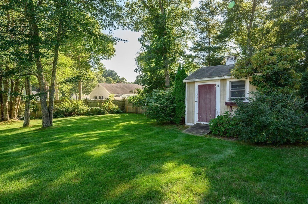 21 Micah Hamlin Road Centerville, MA 02632 - Photo 35 of 42 a front view of a house with garden