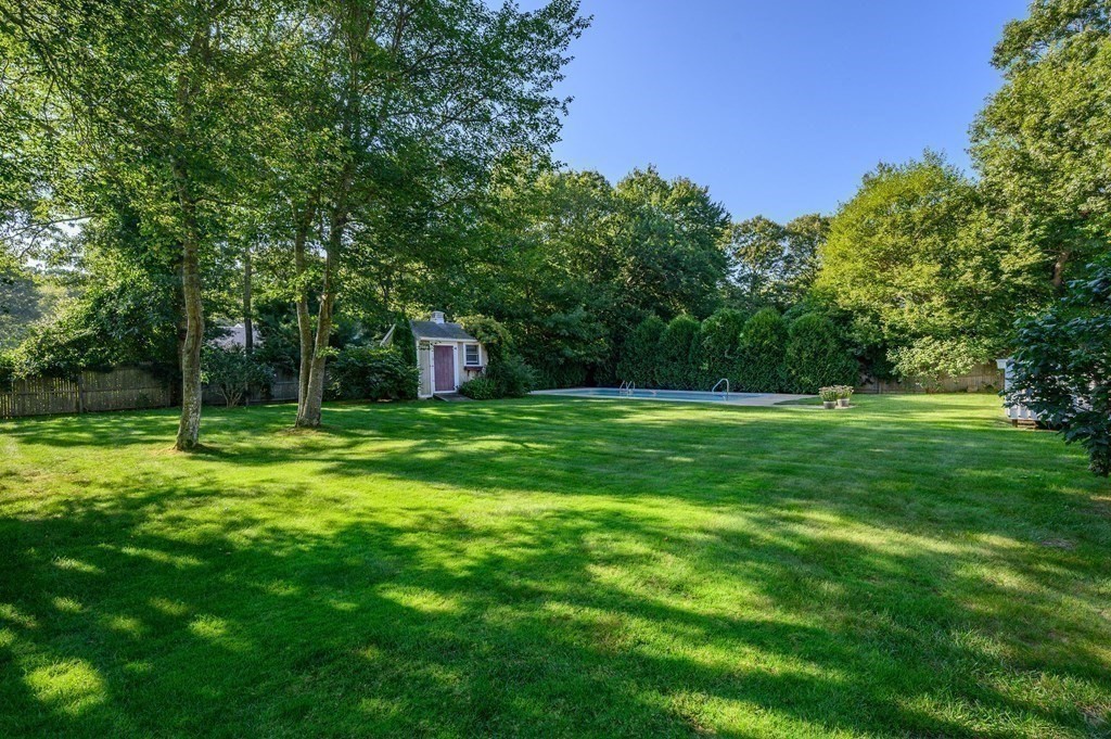 21 Micah Hamlin Road Centerville, MA 02632 - Photo 36 of 42 a view of a house with a big yard