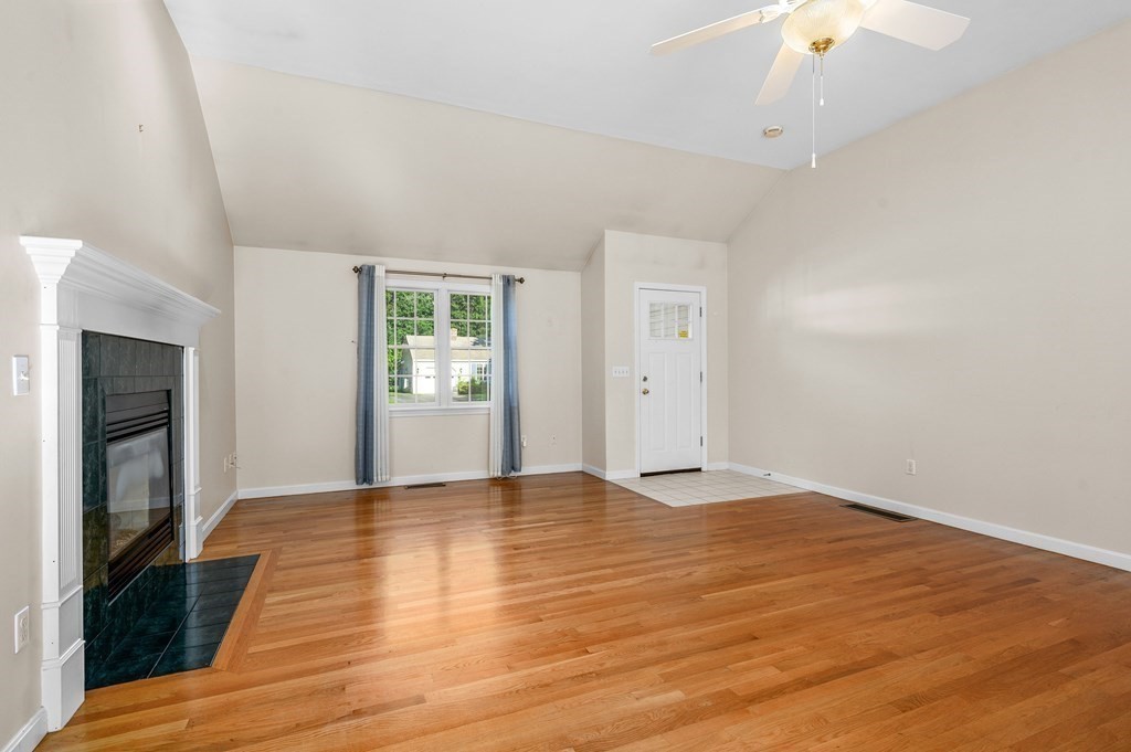 21 Micah Hamlin Road Centerville, MA 02632 - Photo 4 of 42 a view of an empty room with window and wooden floor