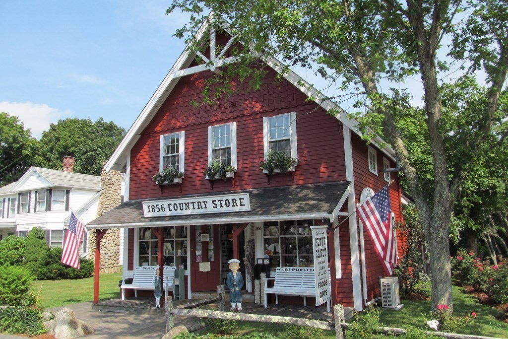 21 Micah Hamlin Road Centerville, MA 02632 - Photo 42 of 42 a front view of a residential apartment building with a yard