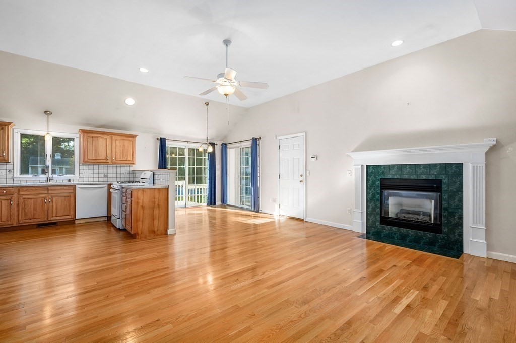 21 Micah Hamlin Road Centerville, MA 02632 - Photo 5 of 42 a open kitchen with a refrigerator and a stove top oven