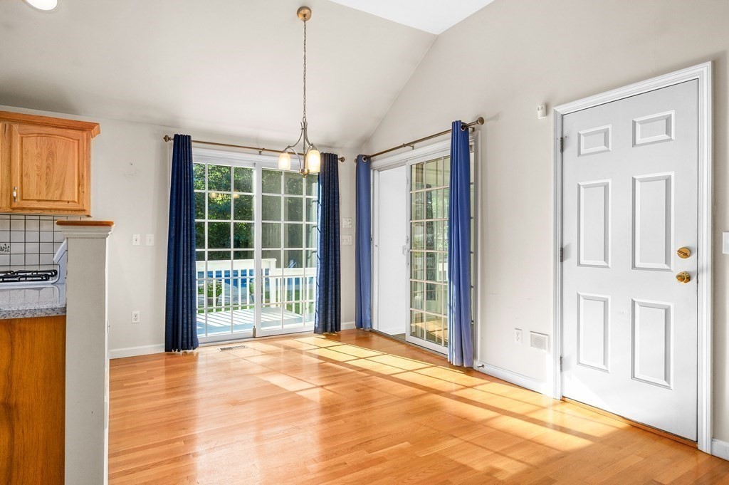 21 Micah Hamlin Road Centerville, MA 02632 - Photo 6 of 42 a view of an empty room with a window and balcony