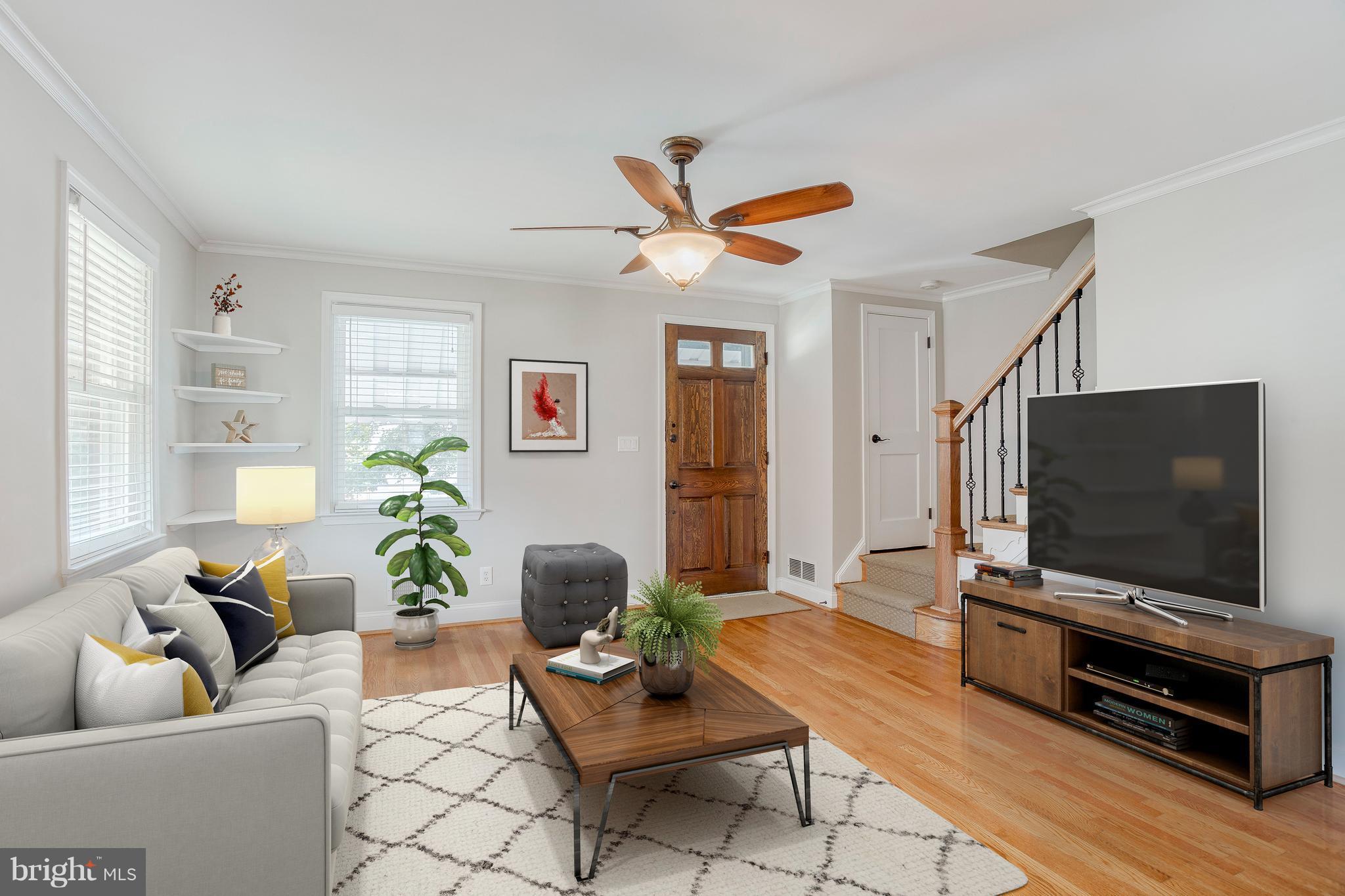 8626 Oak Road Baltimore, MD 21234 - Photo 1 of 30 a living room with furniture and a flat screen tv