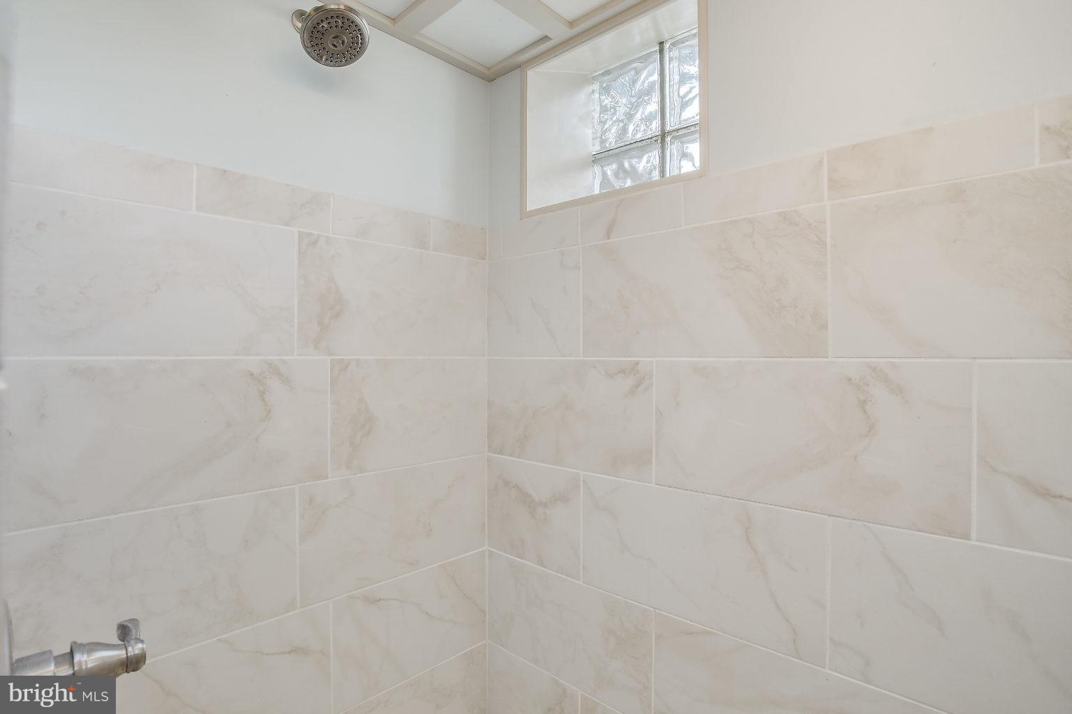 8626 Oak Road Baltimore, MD 21234 - Photo 20 of 30 a bathroom with a shower