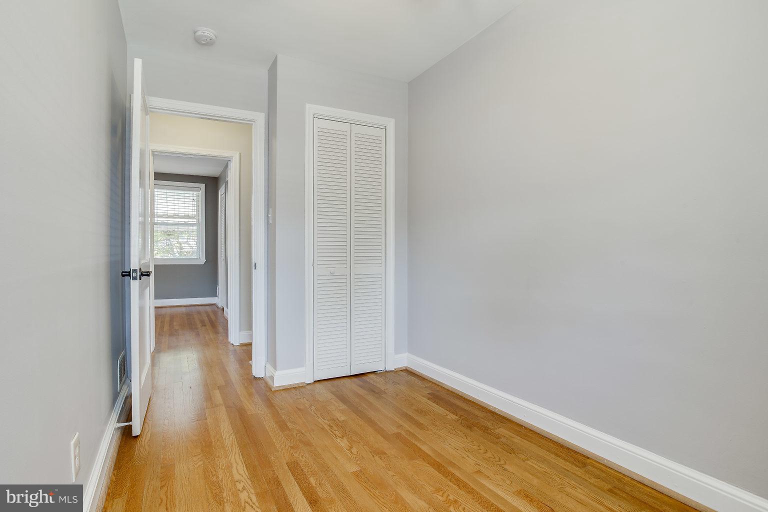 8626 Oak Road Baltimore, MD 21234 - Photo 26 of 30 a view of hallway with wooden floor