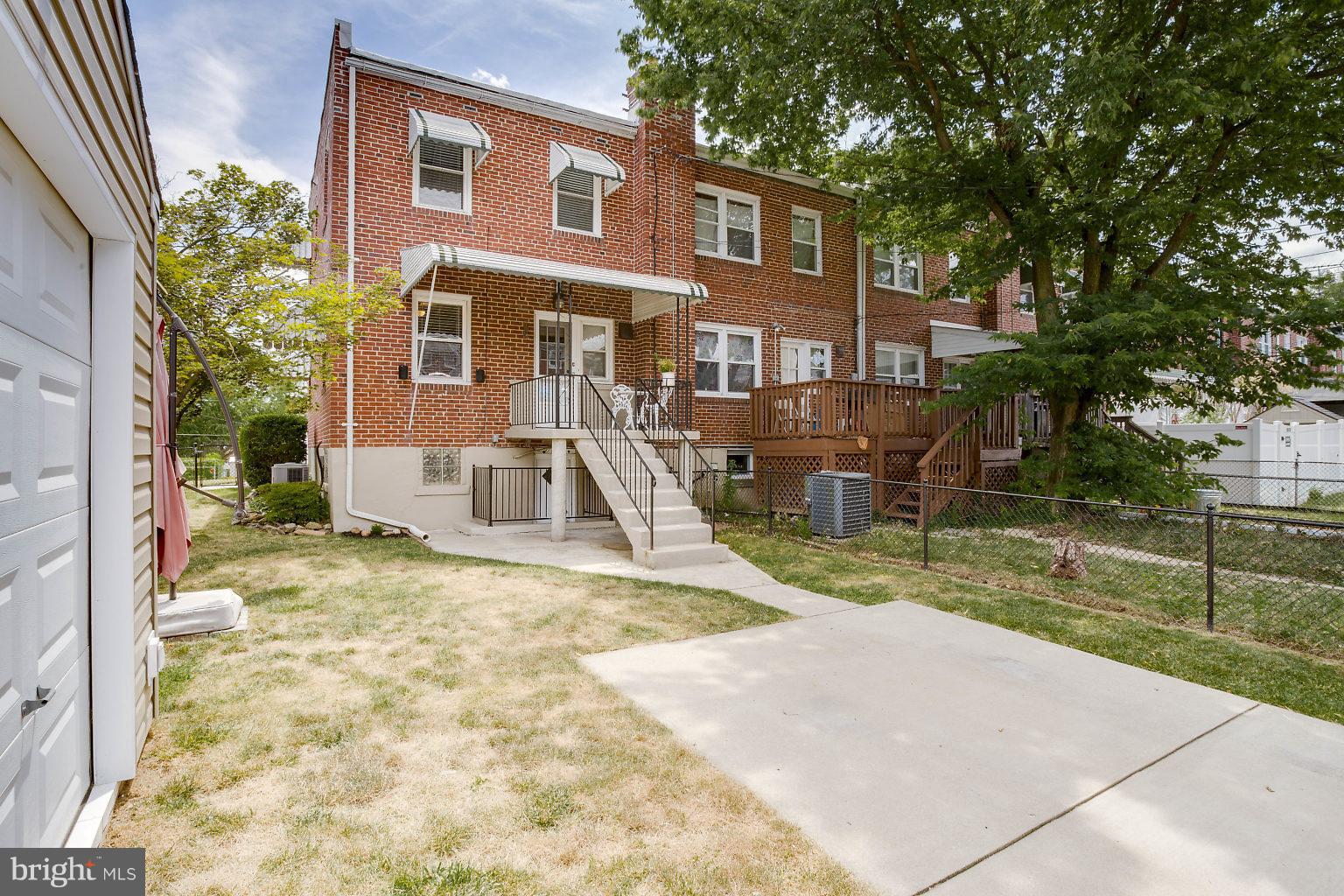 8626 Oak Road Baltimore, MD 21234 - Photo 28 of 30 a view of a house with a yard and tree