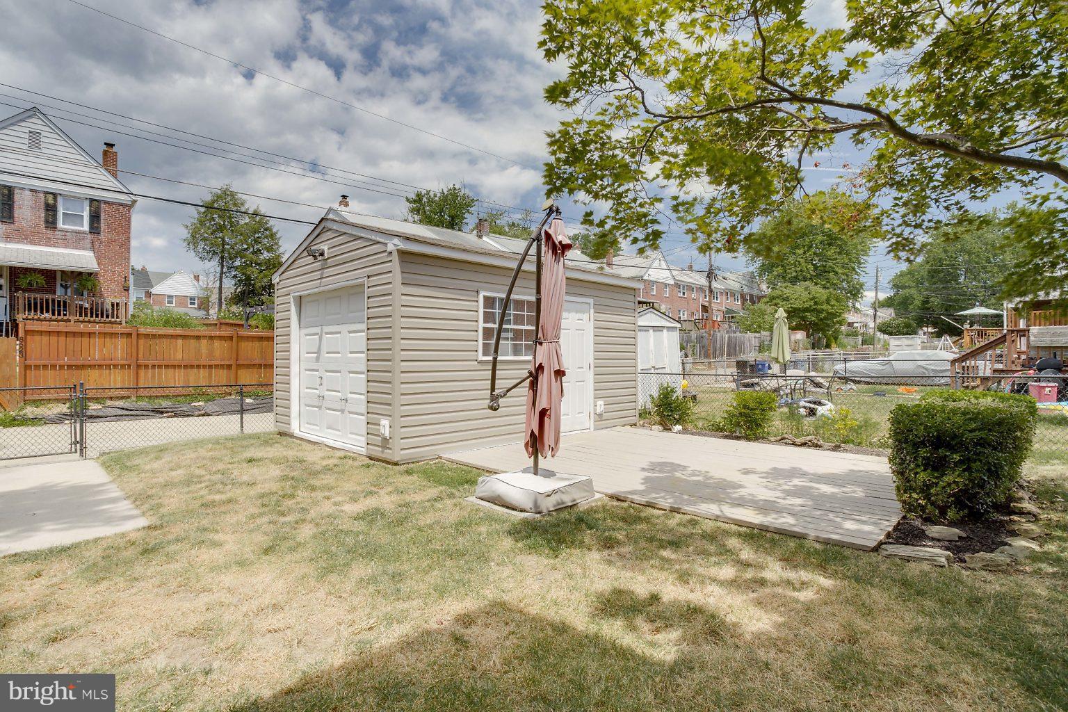 8626 Oak Road Baltimore, MD 21234 - Photo 29 of 30 a view of a house with a patio