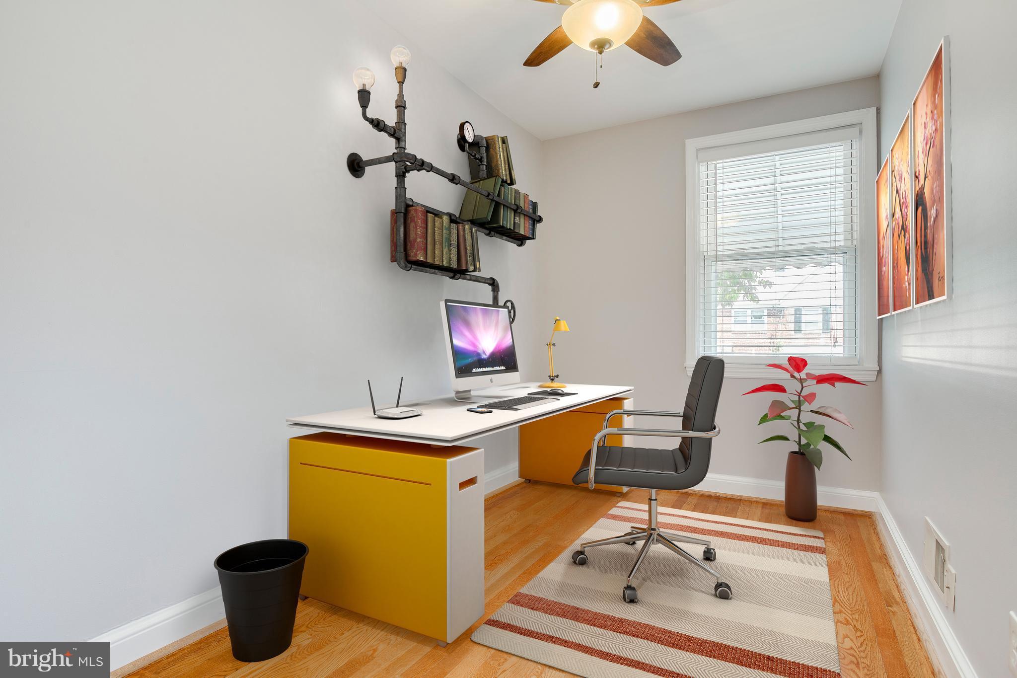 8626 Oak Road Baltimore, MD 21234 - Photo 5 of 30 a work room with a table and a window