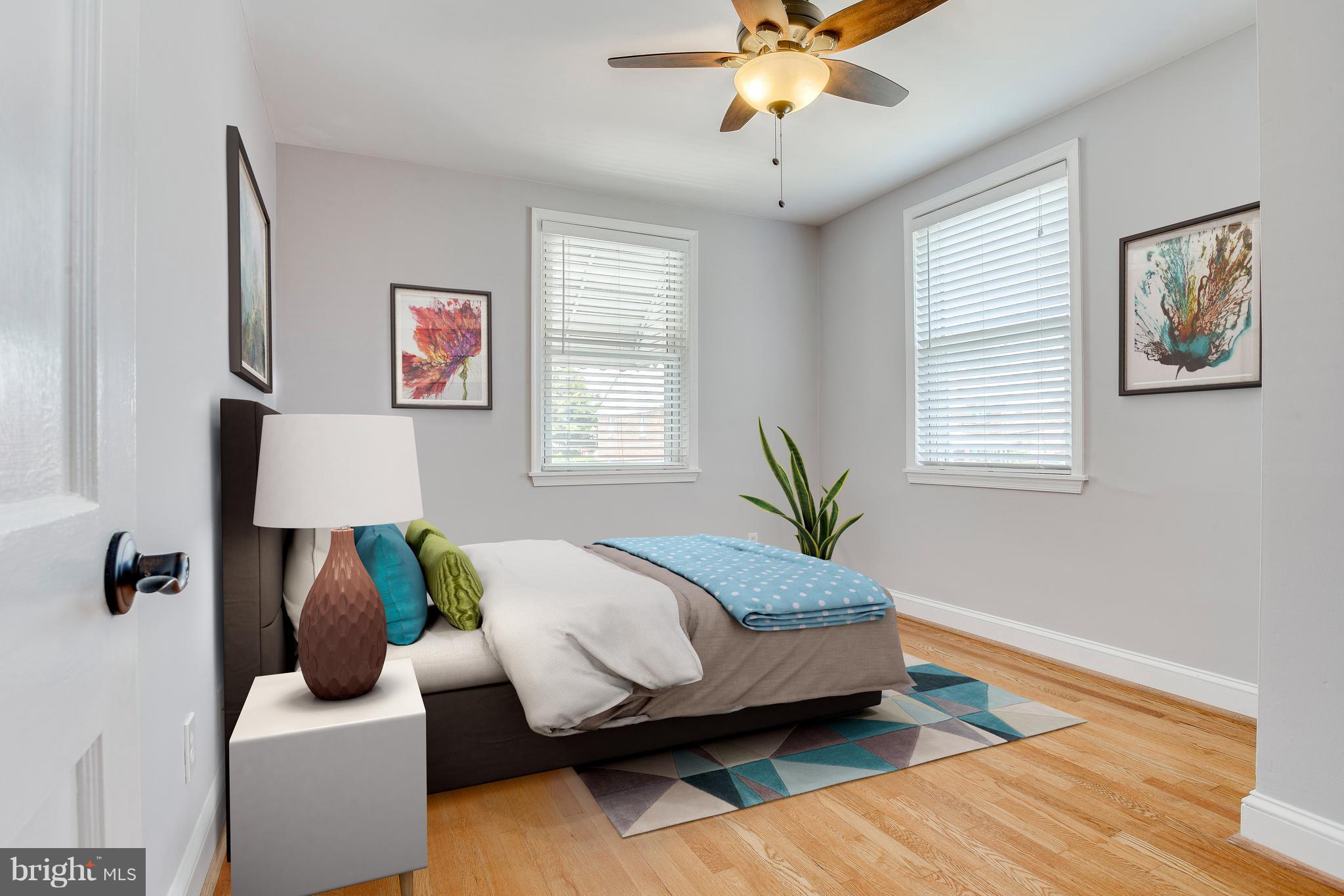 8626 Oak Road Baltimore, MD 21234 - Photo 6 of 30 a bed room with a bed and a window