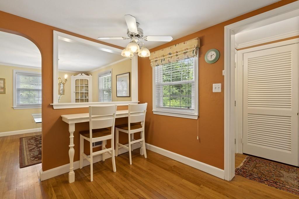 56 Ledgewood Road Dedham, MA 02026 - Photo 11 of 36 a view of a livingroom with furniture wooden floor and chandelier