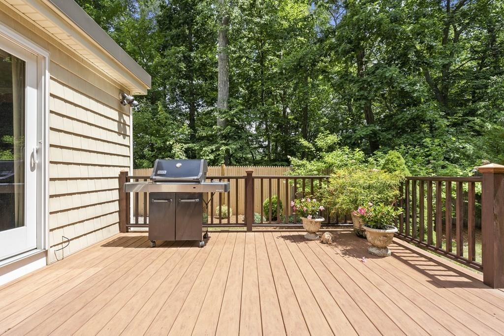 56 Ledgewood Road Dedham, MA 02026 - Photo 31 of 36 a view of a balcony with wooden floor and fence
