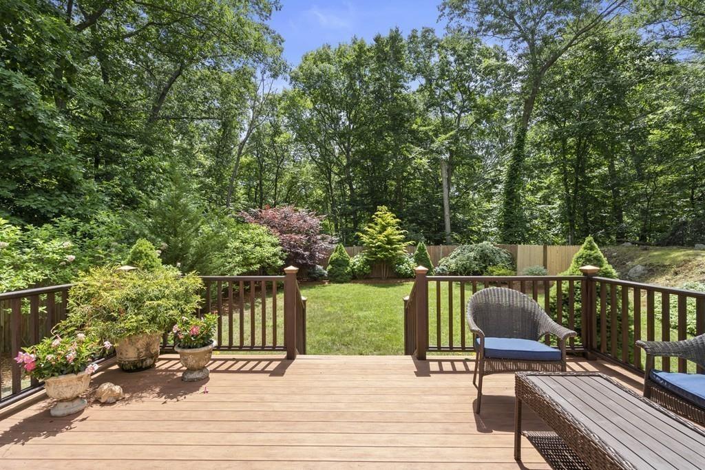 56 Ledgewood Road Dedham, MA 02026 - Photo 32 of 36 a balcony with wooden floor and outdoor seating