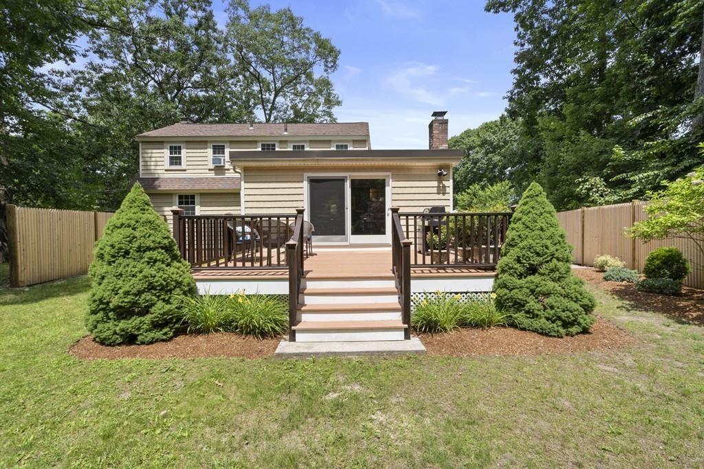 56 Ledgewood Road Dedham, MA 02026 - Photo 33 of 36 a front view of a house with a yard