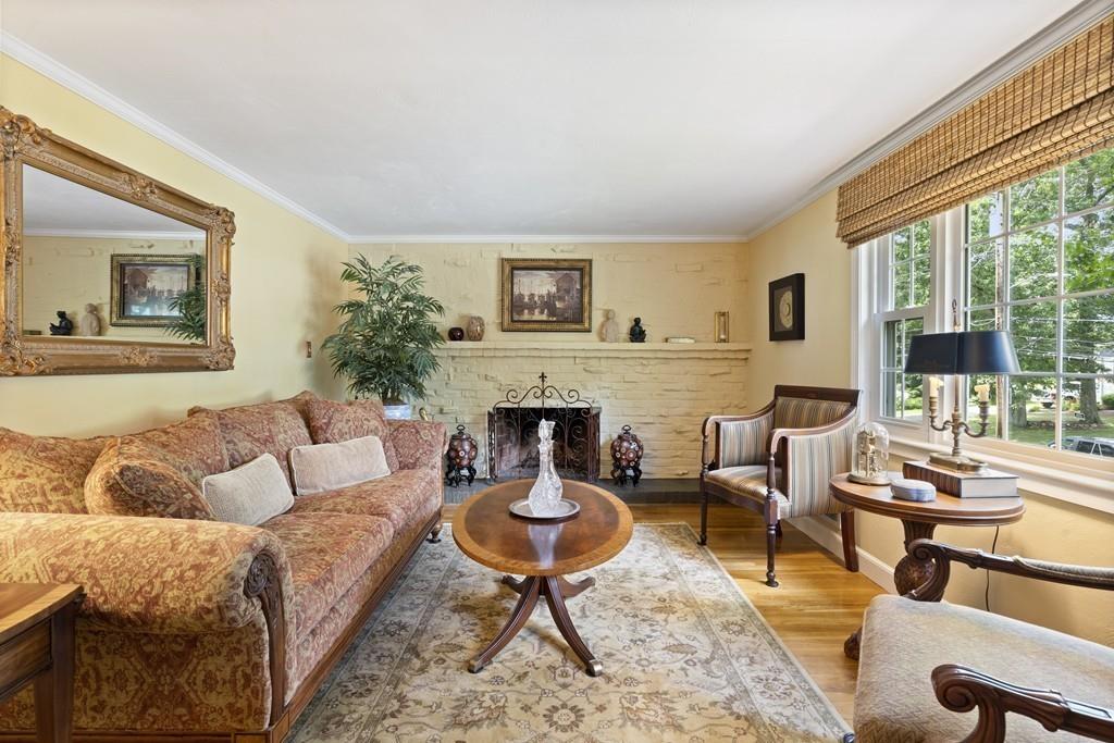 56 Ledgewood Road Dedham, MA 02026 - Photo 5 of 36 a living room with furniture and a fireplace