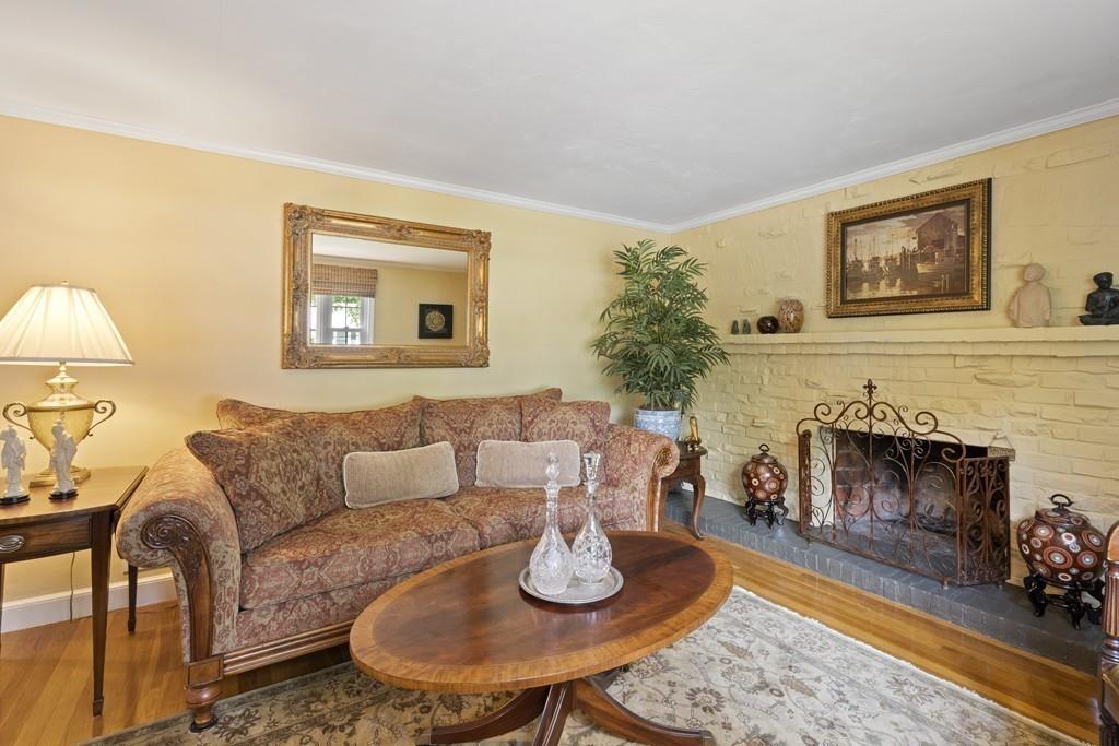 56 Ledgewood Road Dedham, MA 02026 - Photo 6 of 36 a living room with furniture and a fireplace